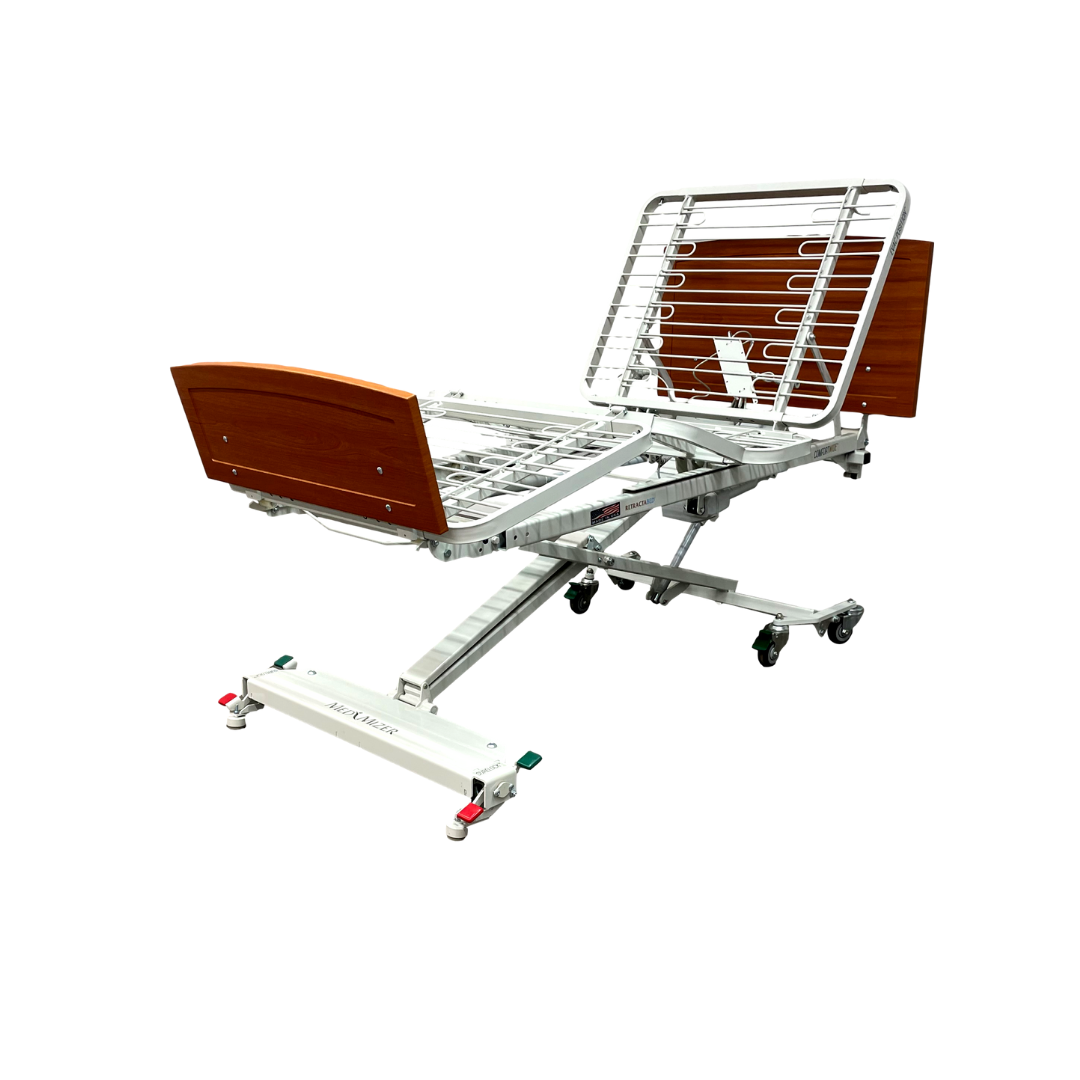 The Med-Mizer RetractaBed Bariatric Hi/Low Electric Bed features width adjustability, height and angle adjustments, sturdy safety rails, a wooden headboard and footboard, and wheels for mobility. Shown on a white background.
